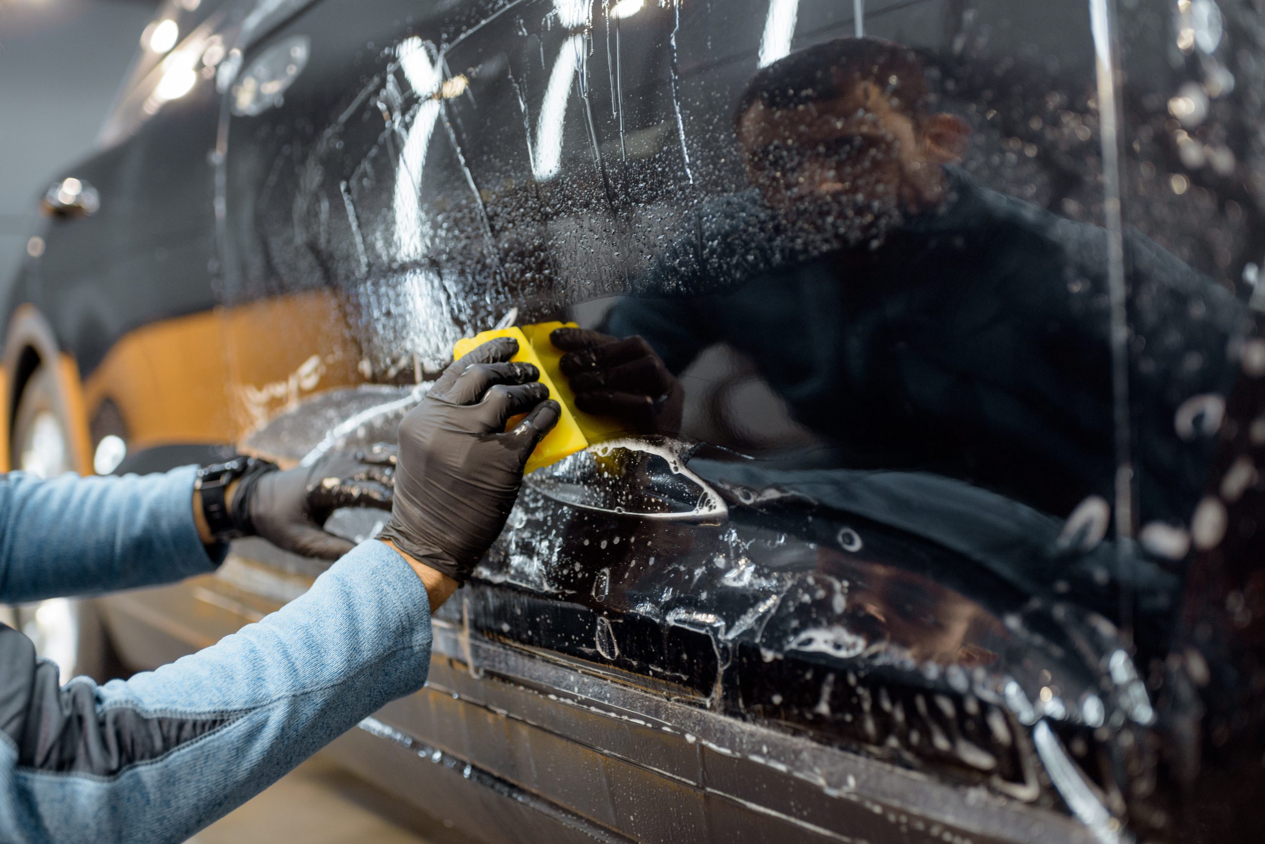 Filming car body at the vehicle service