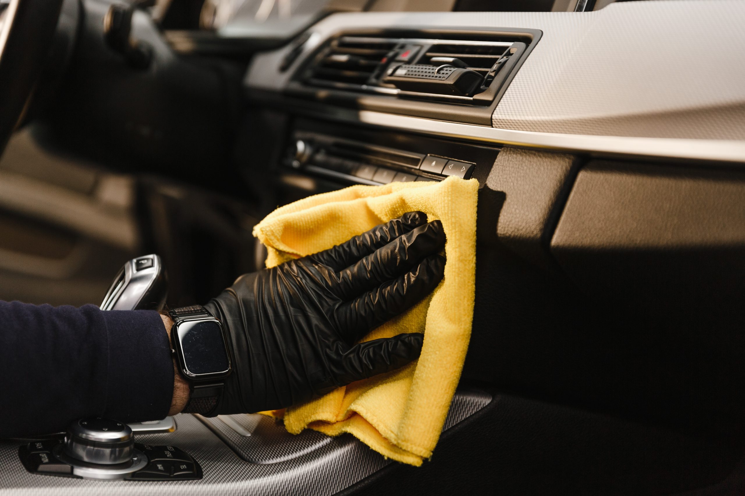 A,Man,Cleans,A,Car,And,Dries,The,Interior,With
